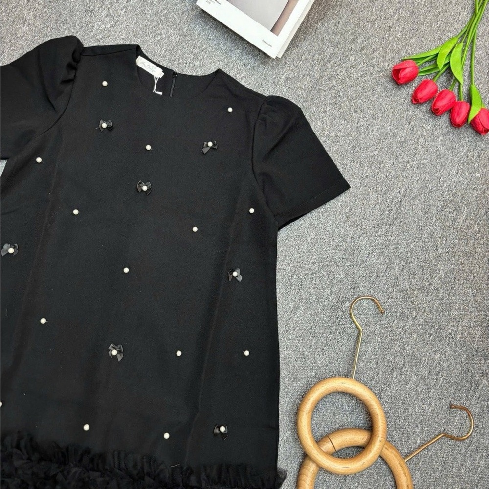 Elegant Black Dress with Pearl Accents